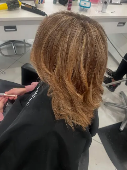 Classic soft blonde highlights on long hair
